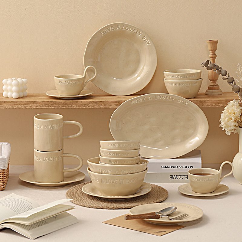 Have a Lovely Day dinner set displayed on a wooden shelf