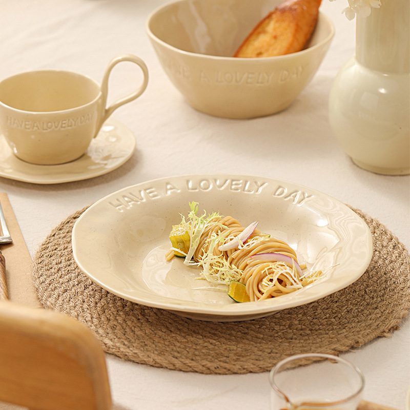 Pasta plate served on a set table